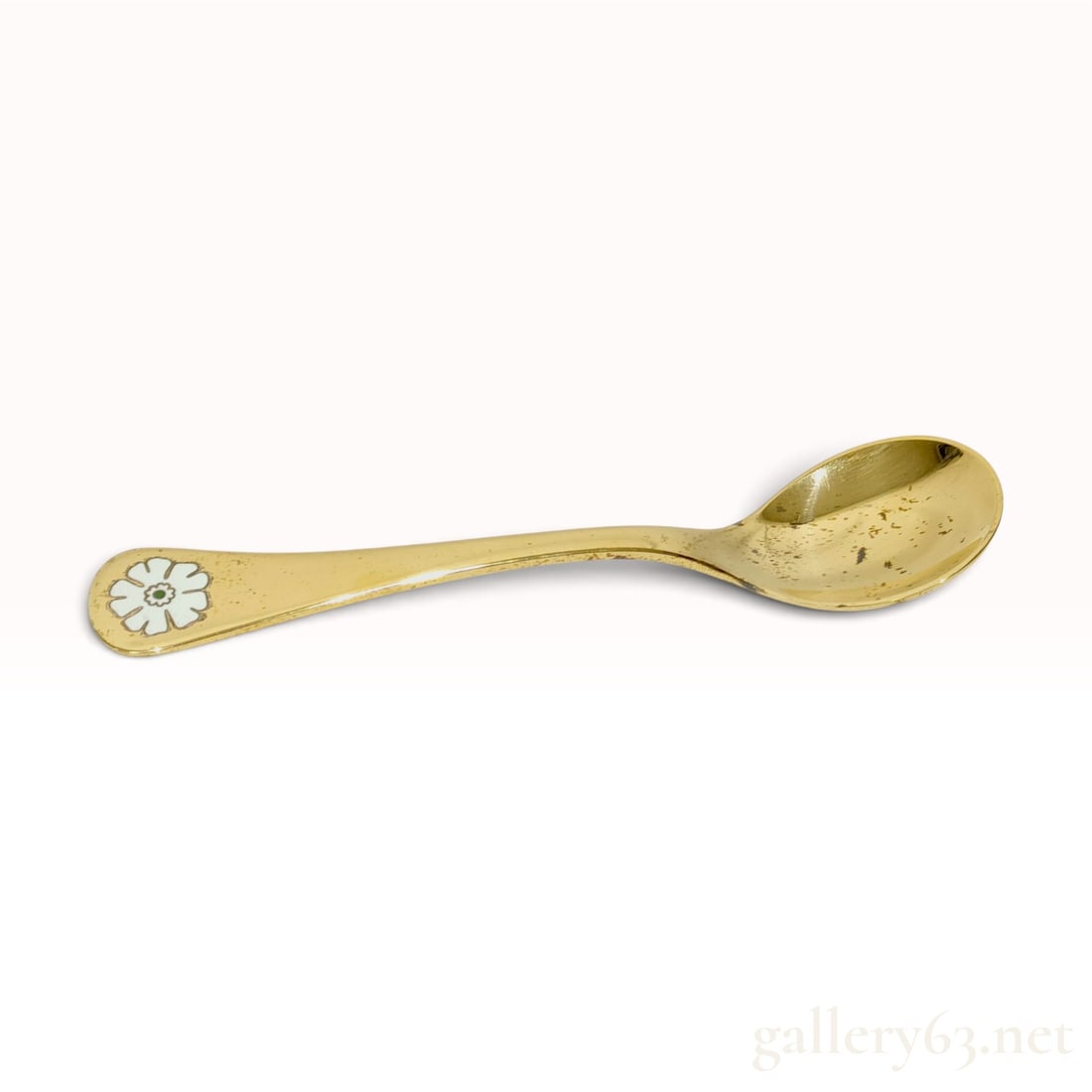 Vintage Georg Jensen 1981 Gilt Sterling Silver Annual Spoon with Box: This Georg Jensen 1981 annual spoon is crafted from gilt sterling silver and features an inset white enamel daisy at the handle terminal. The floral design includes a single green enamel center. The e