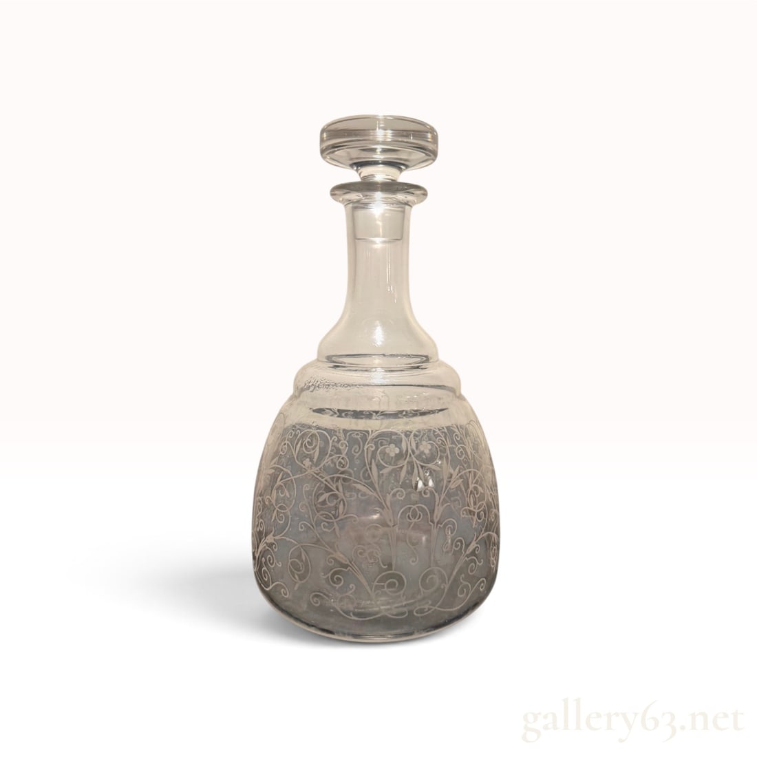 Baccarat Crystal 'Lulli' Liquor Decanter with Stopper -- Etched Floral Scroll, Signed France: A Baccarat crystal liquor decanter in the retired Lulli pattern, made in France, complete with its original crystal stopper. The body is a broad tapered bell rising to a slender neck and flared collar