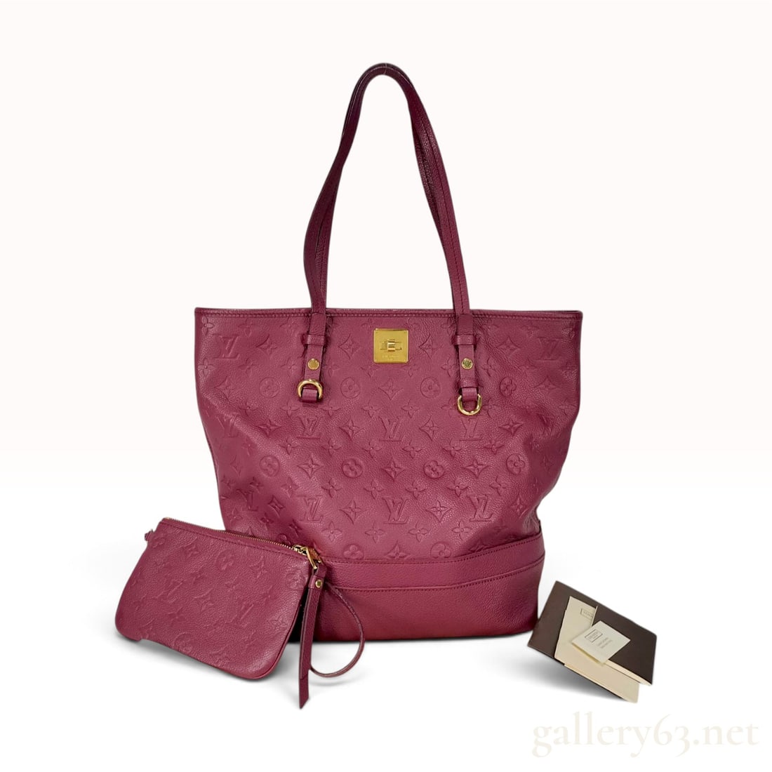 Louis Vuitton Citadine PM Aurore Monogram Empreinte Leather Tote Bag With Pouch: This Louis Vuitton Citadine PM tote is crafted from Aurore Monogram Empreinte leather, featuring the signature monogram pattern embossed throughout the calfskin exterior. The bag is designed with dual