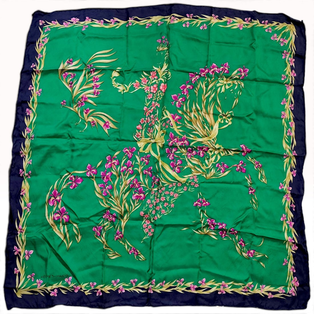 Vintage Hermes Cheval Fleuri (Flowering Horse) Silk Carre 90: This Hermes silk carre 90 features the Cheval Fleuri (Flowering Horse) pattern designed by Henri d'Origny. The design presents a central composition of stylized irises and sweeping foliage that form t