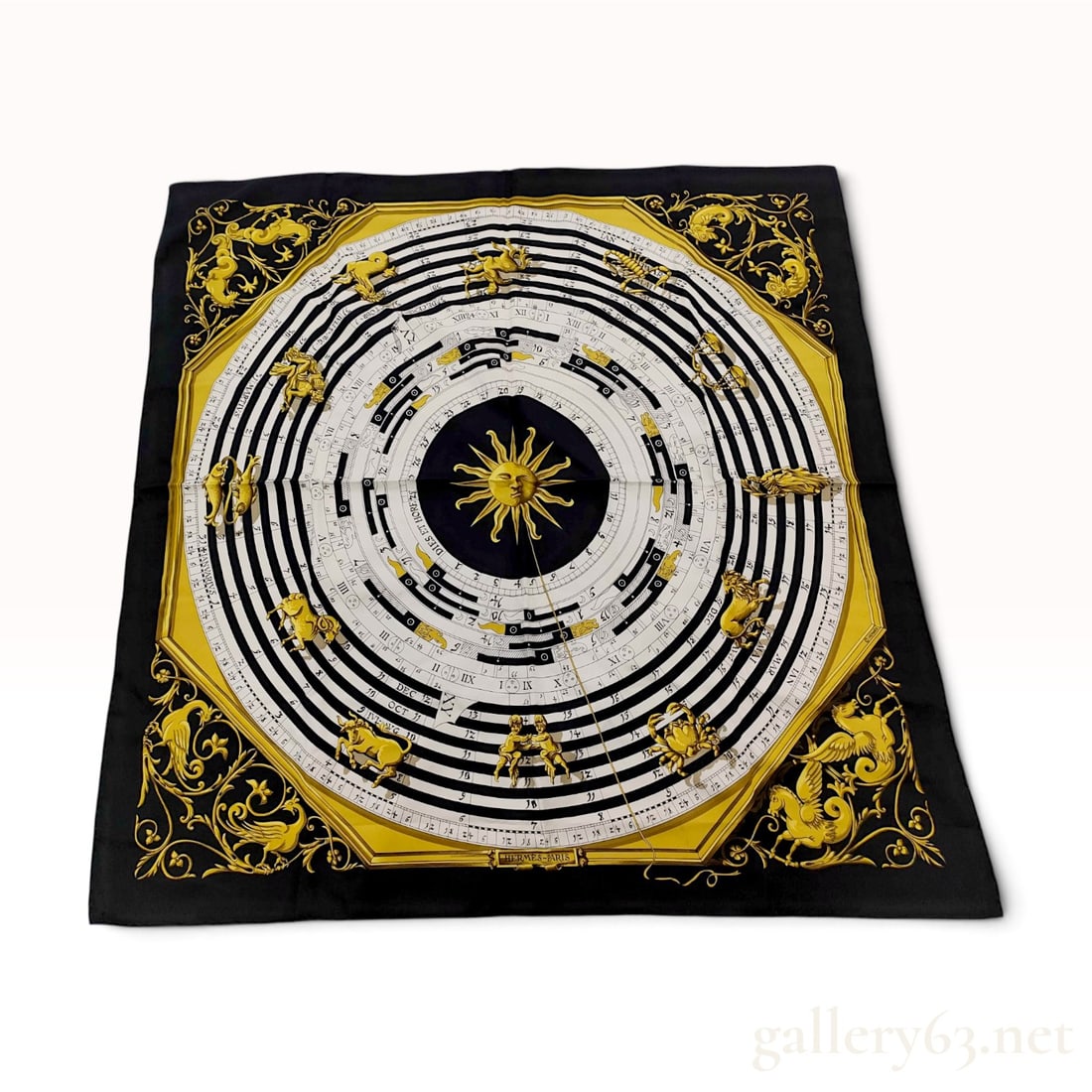 Vintage Hermes Dies et Hore Silk Carre 90: This vintage Hermes silk carre 90 features the Dies et Hore (Days and Hours) design by Loic Dubigeon, originally introduced in 1963. The astronomical and astrological composition centers on a radiant 