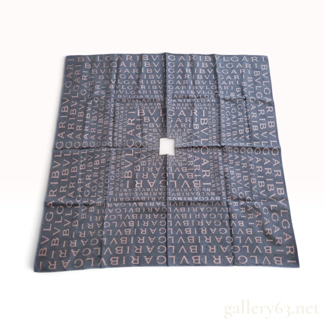 Vintage Bvlgari Logomania Monogram Gray and Pink Silk Scarf 53 cm: This Bvlgari silk scarf is crafted from 100% silk twill with hand-rolled and hand-stitched hems. The design features a charcoal gray ground decorated with an allover dusty rose pink monogram print of 