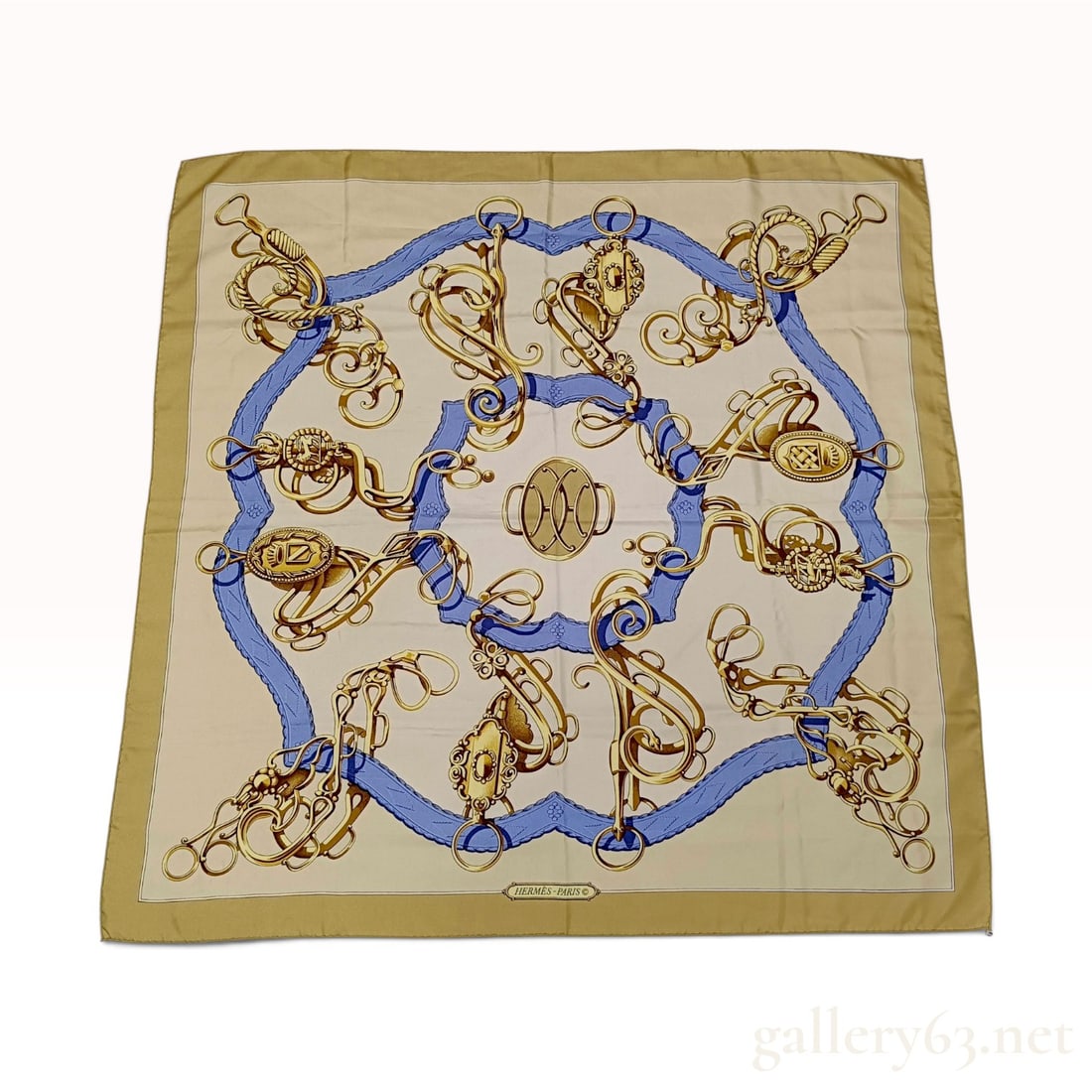 Vintage Hermes Mors et Gourmettes Olive and Cream Silk Carre 90: This is a Hermes silk carre 90 in the Mors et Gourmettes (Bits and Curb Chains) pattern designed by Henri d'Origny. The equestrian-themed composition features an elaborate arrangement of golden mors a