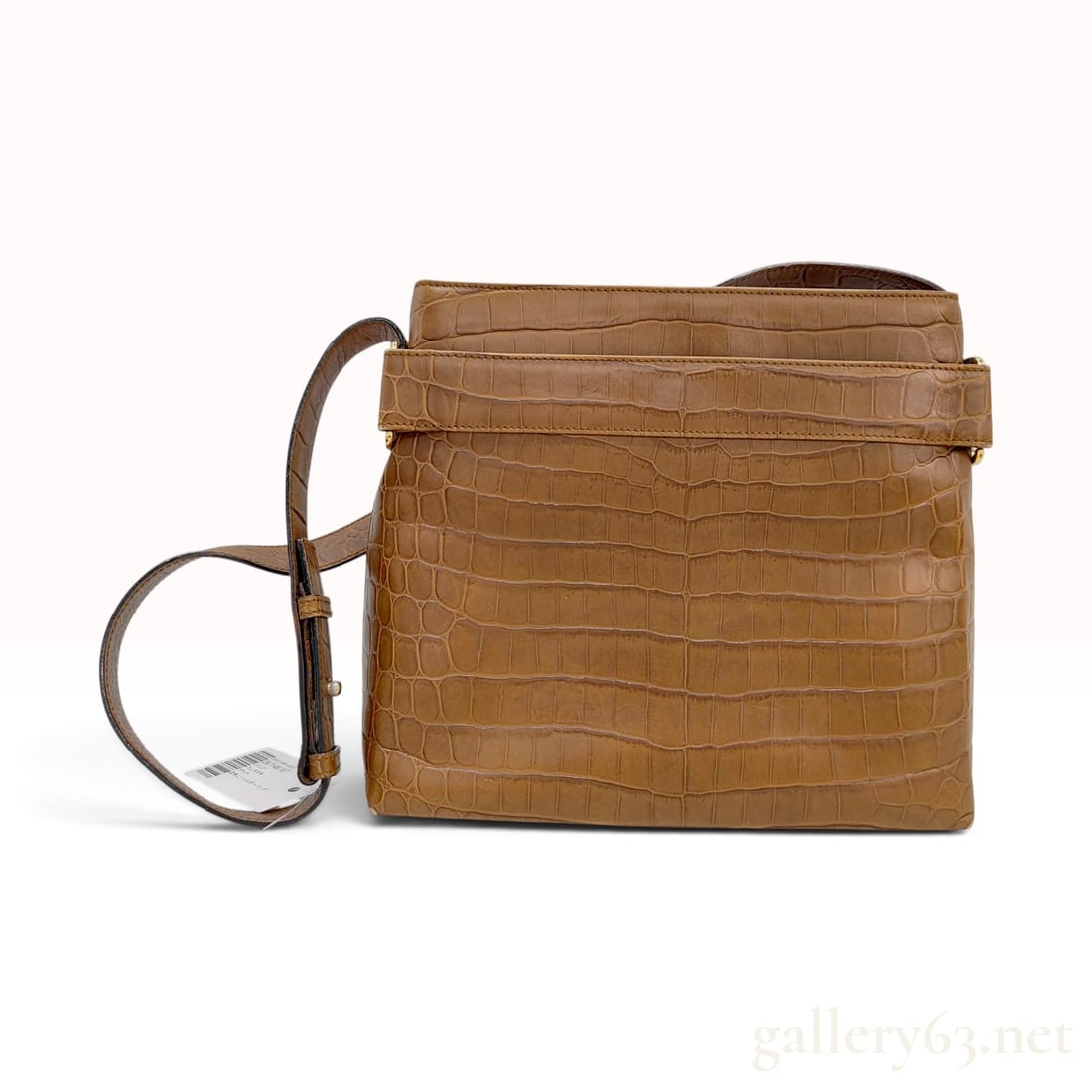 Vintage Salvatore Ferragamo Cognac Crocodile-Embossed Leather Shoulder Bag with Tag: This Salvatore Ferragamo shoulder bag is crafted from cognac-colored crocodile-embossed leather with a structured rectangular silhouette. The design features a top zipper closure and an adjustable fla