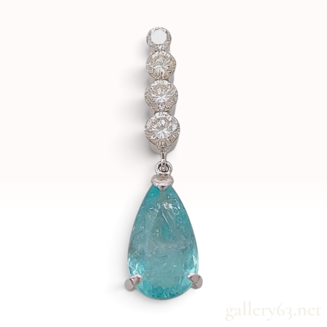 An 18KWG 2.06ct Natural Tourmaline and 0.45ctw Natural Diamond Pendant with Reports: This is an 18KWG drop pendant featuring a pear-cut natural tourmaline suspended from a graduated line of natural diamonds. The pendant is composed of a vertical line of four round brilliant-cut natura