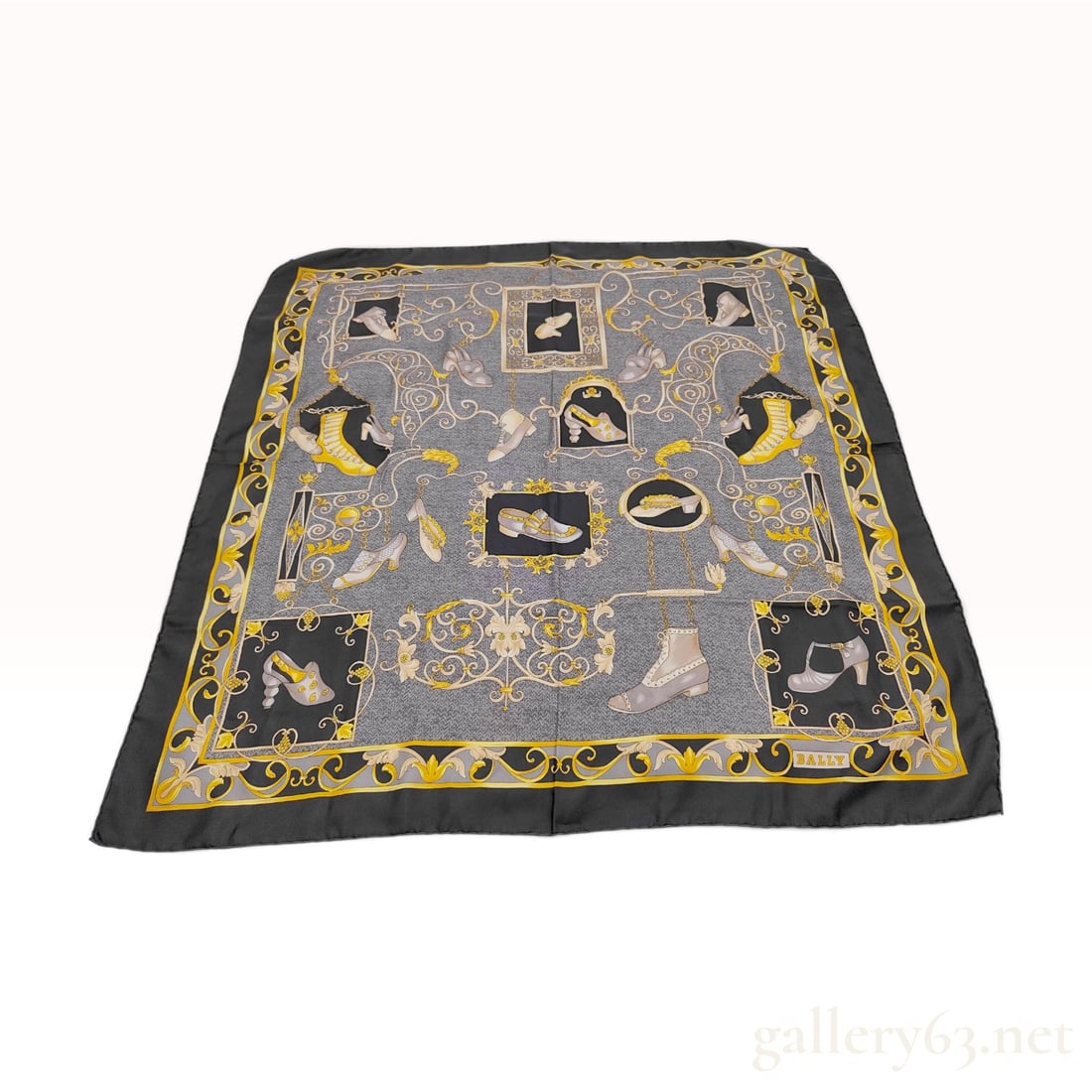 Vintage Bally Historic Footwear Gray and Gold Silk Scarf 90 cm: A Bally silk scarf 90 cm crafted from silk twill featuring an illustrative historic footwear design. The composition displays various nineteenth and early twentieth-century style shoes, including butt