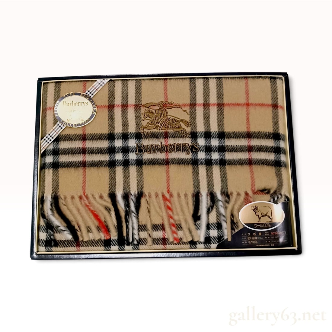 Vintage Burberrys Nova Check Wool Knee Rug 65 x 120 cm with Box: This vintage Burberrys knee rug is crafted from 100% woven wool in the house check pattern, also known as Nova Check. The textile features a tan ground with intersecting black, white, and red stripes 