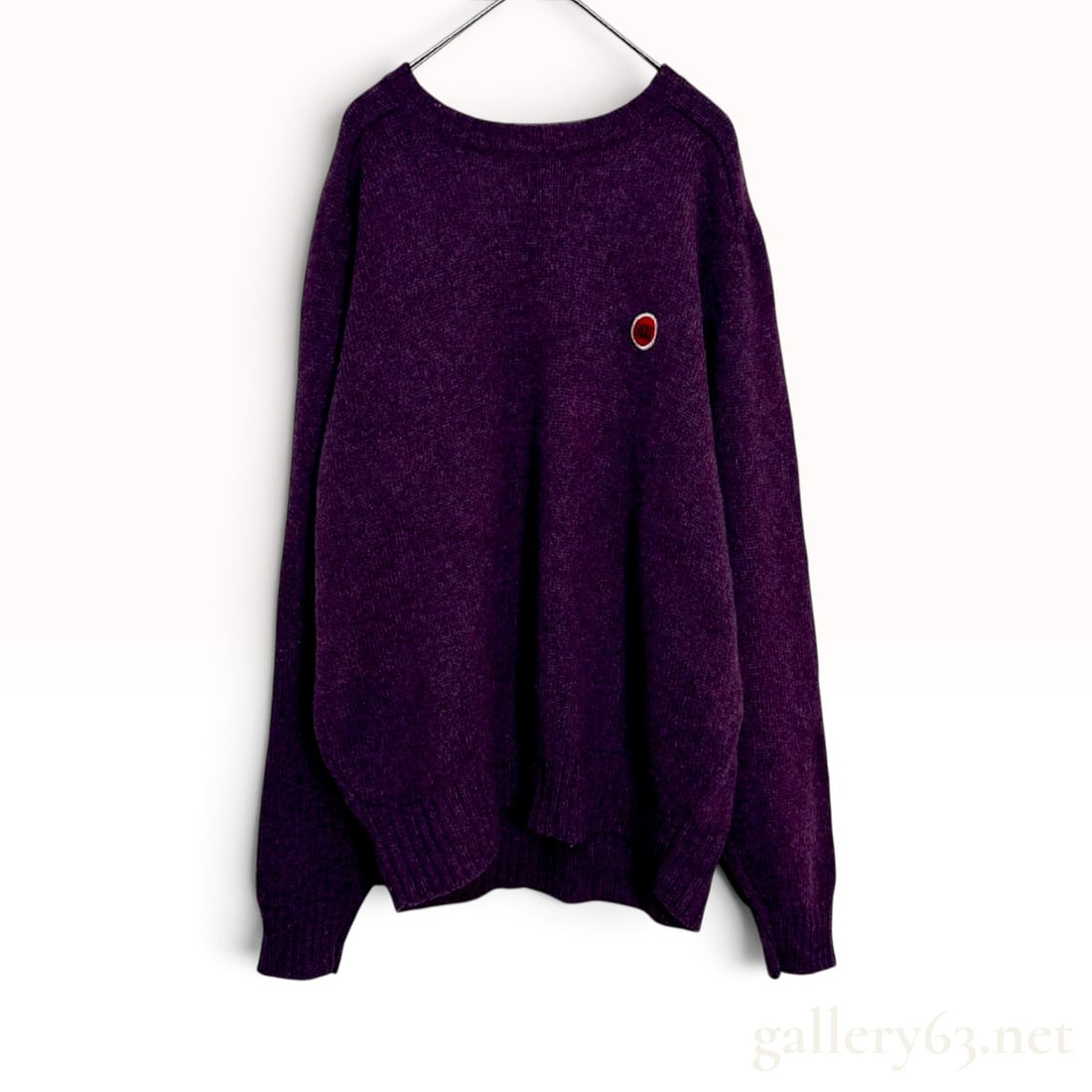 Vintage Lucky Strike Original American Casual Purple Wool Crew Neck Sweater Size L: This Lucky Strike crew neck sweater is crafted from a 100% new wool knit in a mottled dark purple colorway. The garment is constructed with raglan sleeves and wide-ribbed knitting at the neckline, cuf