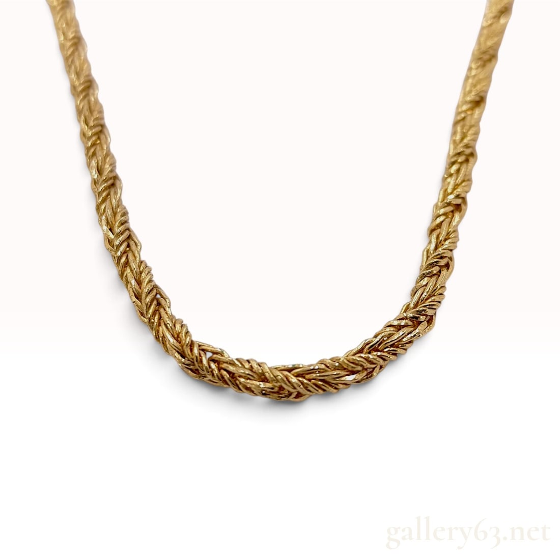 Vintage Christian Dior Gold Tone Twisted Rope Chain Necklace with Pouch: This is a vintage Christian Dior chain necklace from the Bijoux line, featuring a dense, multi-strand twisted rope chain construction. The necklace is crafted from bright gold-tone base metal and inco