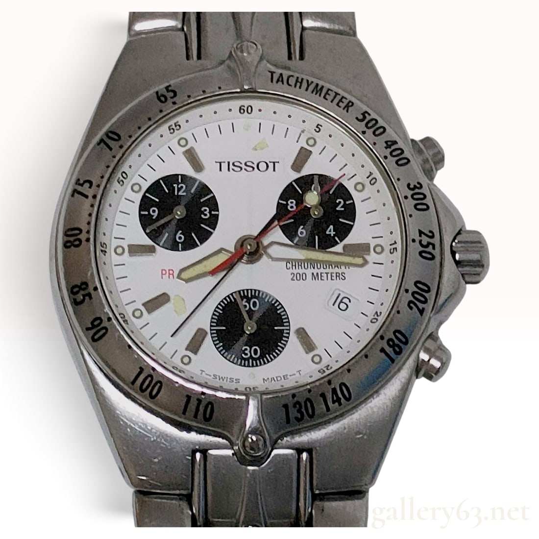 Vintage Tissot PR 200 White Panda Dial Stainless Steel Chronograph 36mm: This Tissot PR 200 chronograph is constructed from stainless steel with an integrated multi-link bracelet. The watch features a white Panda dial with three recessed black sub-dials, silver-tone baton 