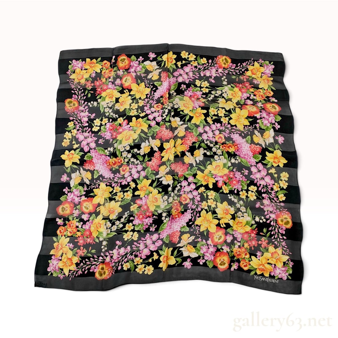 Vintage Yves Saint Laurent Floral Striped Black Silk Scarf 90 cm: This Yves Saint Laurent silk scarf is crafted from 100% silk with a decorative weave featuring alternating horizontal bands of solid black and semi-sheer black silk chiffon. The design displays a dens