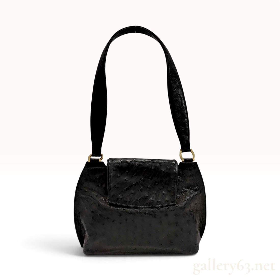 Vintage SARI 2000 Black Ostrich Leather Shoulder Handbag: This Italian SARI 2000 shoulder handbag is crafted from black genuine ostrich leather, featuring the distinct quill follicle texture across the body and strap. The bag is designed with a structured, f