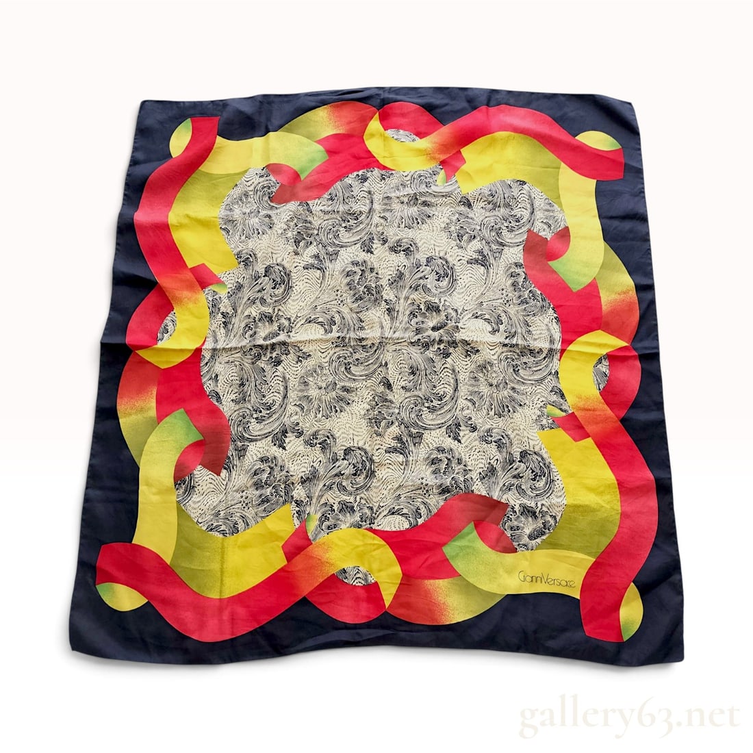 Vintage Gianni Versace Baroque Ribbon Motif Silk Scarf 90 cm: This Gianni Versace silk scarf is crafted from silk twill featuring a central baroque-inspired panel of monochromatic dark navy scrolling acanthus leaves and floral motifs on a cream ground. The centr