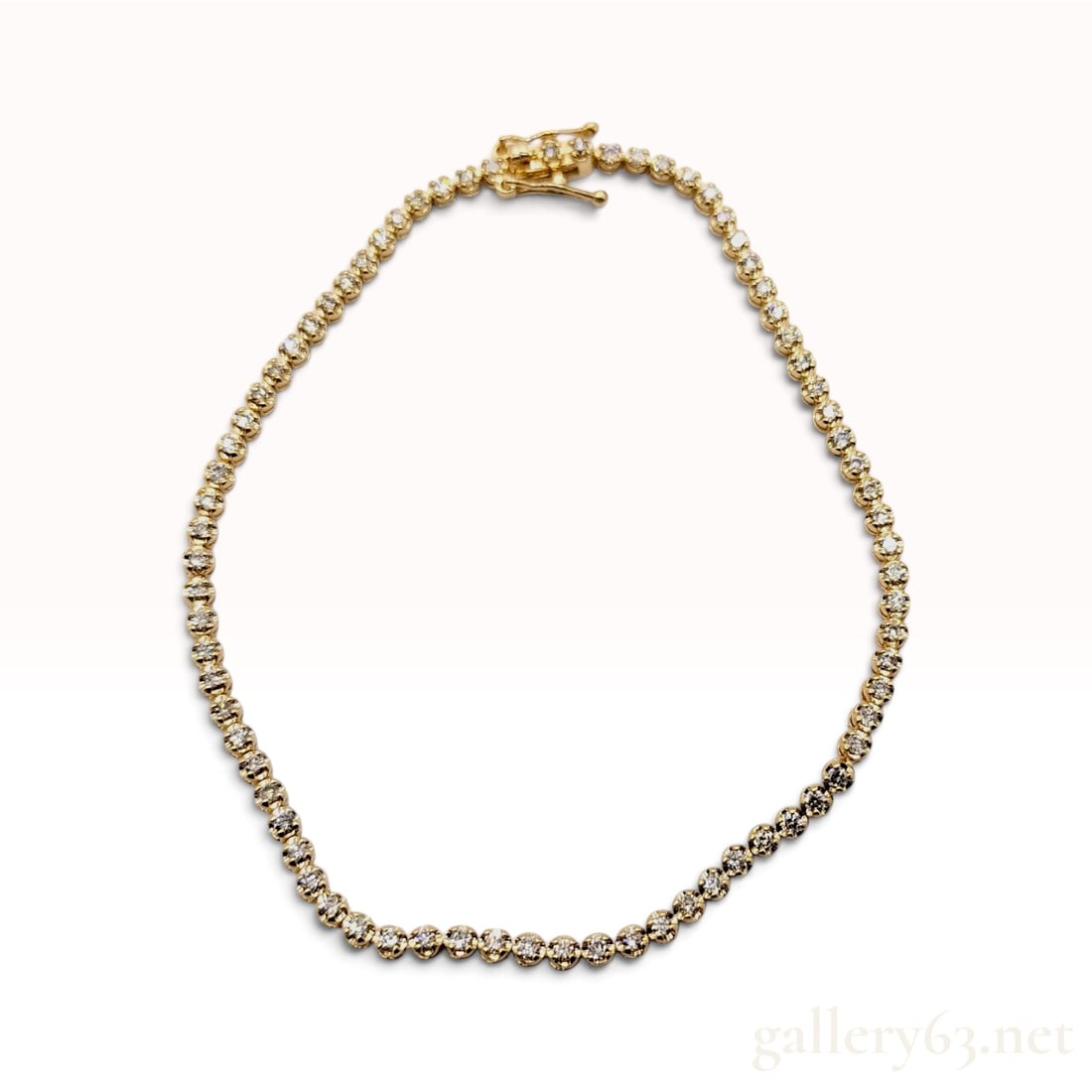 18K Yellow Gold 1.00ctw Natural Diamond Tennis Bracelet with Gem Identification Report: An 18 karat yellow gold tennis bracelet featuring a continuous line of approximately 71 round brilliant cut natural diamonds. Each gemstone is individually secured in a four-prong circular link settin