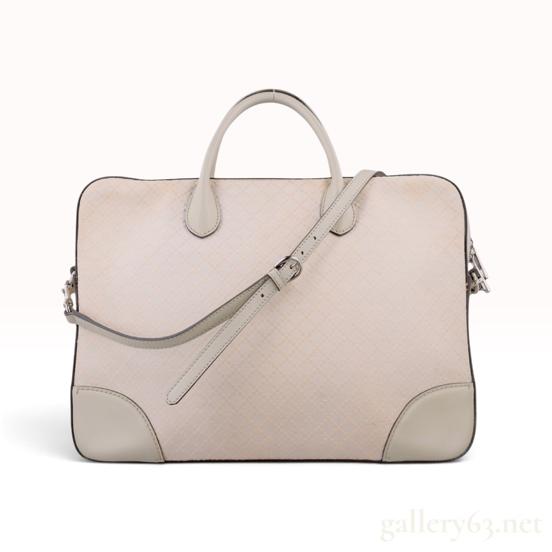 Gucci Diamante Pattern Cream Canvas and Gray Leather Briefcase with Shoulder Strap: This Gucci briefcase is crafted from woven diamante pattern canvas in a cream colorway with light gray leather trim. The structured design features reinforced leather corners, rolled leather top handl