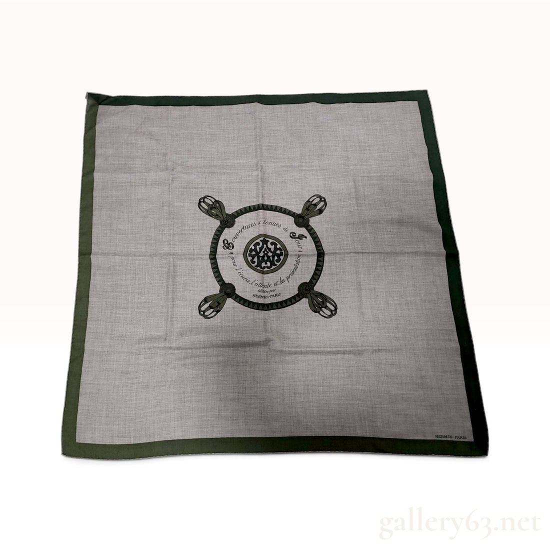 Herm?¨s Couvertures et Tenues de Jour Grey Cashmere and Silk Scarf 63 cm with Box: This Herm?¨s scarf is crafted from a 70% cashmere and 30% silk blend in a grey and dark forest green colorway with a herringbone weave. The Couvertures et Tenues de Jour equestrian pattern features a
