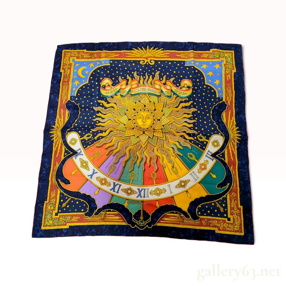 Vintage Hermes Carpe Diem (Seize the Day) Navy Multicolor Silk Carre 90: This Hermes silk carre 90 crafted from 100% silk features the Carpe Diem pattern designed by Joachim Metz. The central motif depicts a radiant sun with a human face surrounded by astronomical symbols 