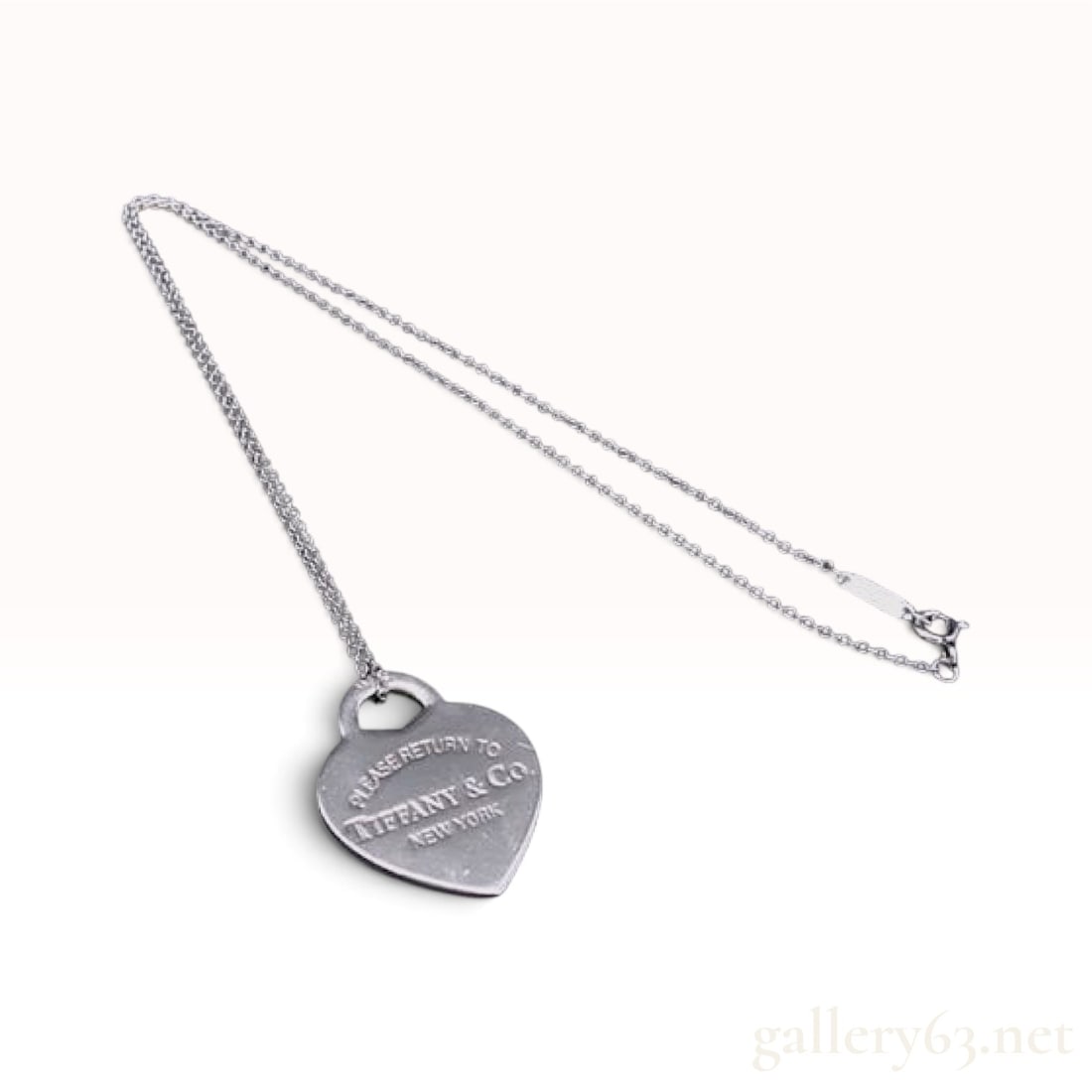 Tiffany & Co. Return to Tiffany Sterling Silver Heart Tag Pendant Necklace: This Tiffany & Co. heart tag pendant necklace is crafted from sterling silver and belongs to the Return to Tiffany collection. The jewelry design consists of a heart-shaped tag pendant suspended from 