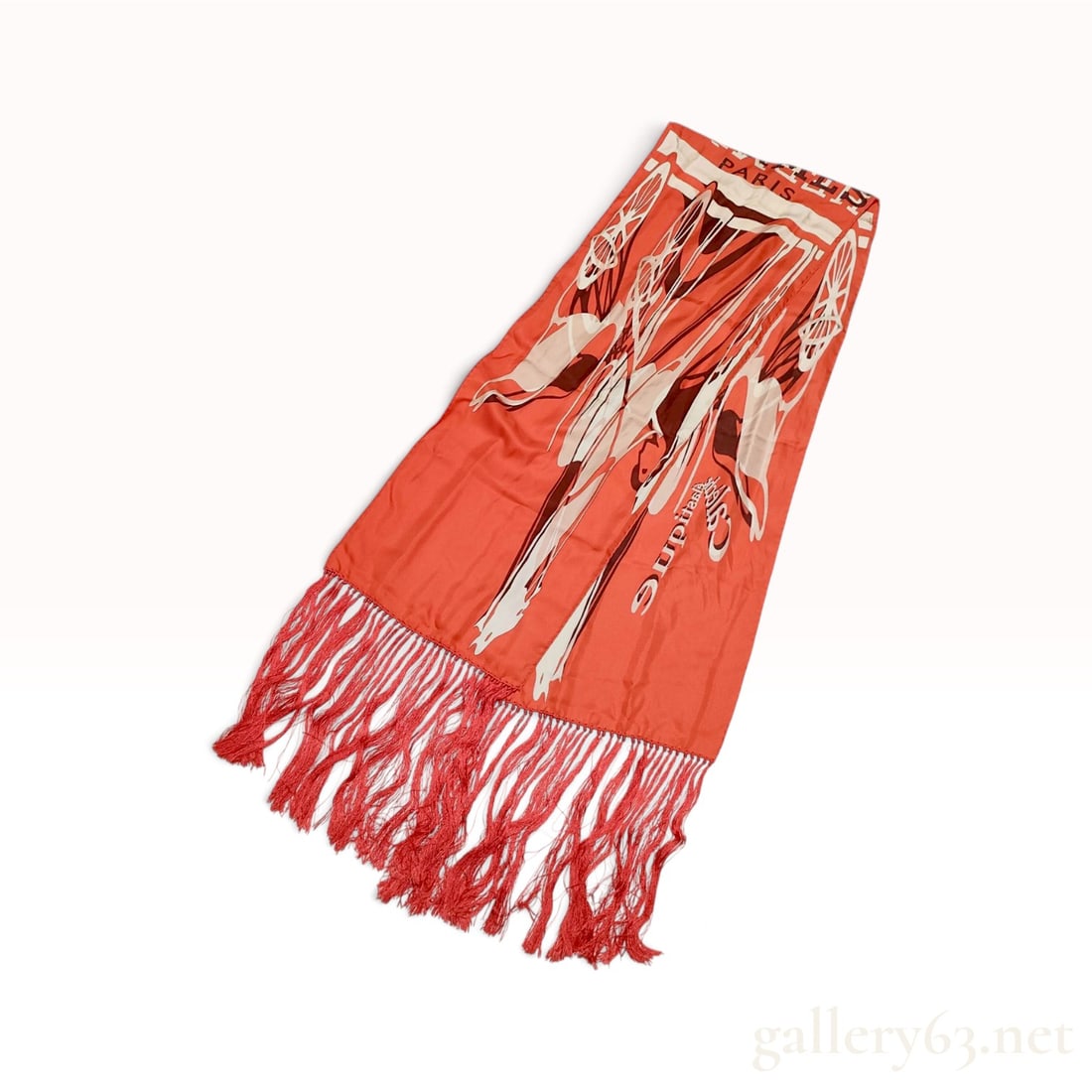 Hermes Caleche Elastique Orange Silk Fringed Stole: This Hermes silk fringed stole is crafted from 100% silk twill in the Caleche Elastique pattern designed by Bali Barret. The graphic equestrian design features stylized wheels and carriage frames in s