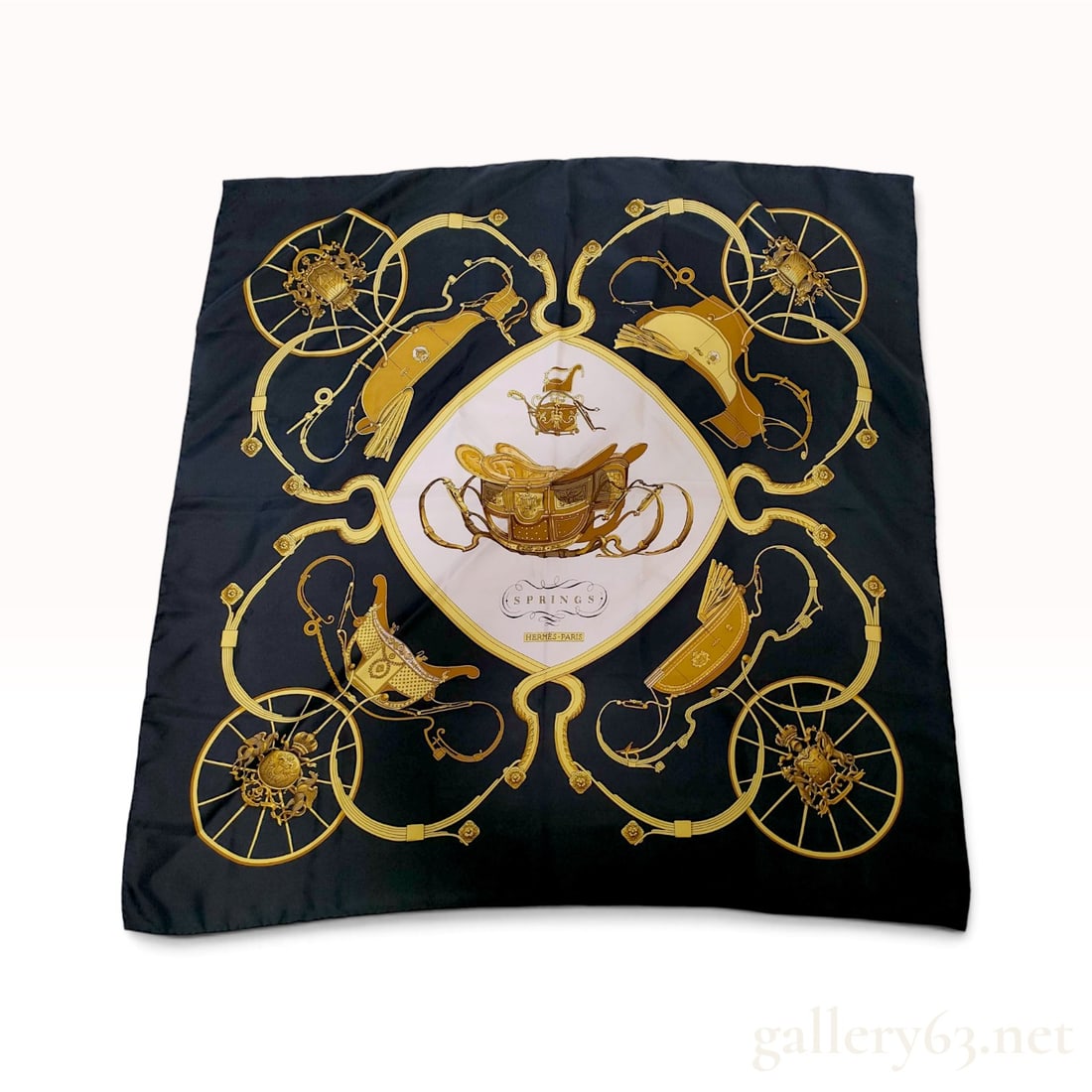Two Designer Silk Scarves Including Herm?¨s Springs Black Silk Carre 90: This collection includes two designer silk scarves, one by Herm?¨s and one by Burberry. The Herm?¨s silk carre 90 is designed in the Springs pattern by Philippe Ledoux, featuring a central carriage 