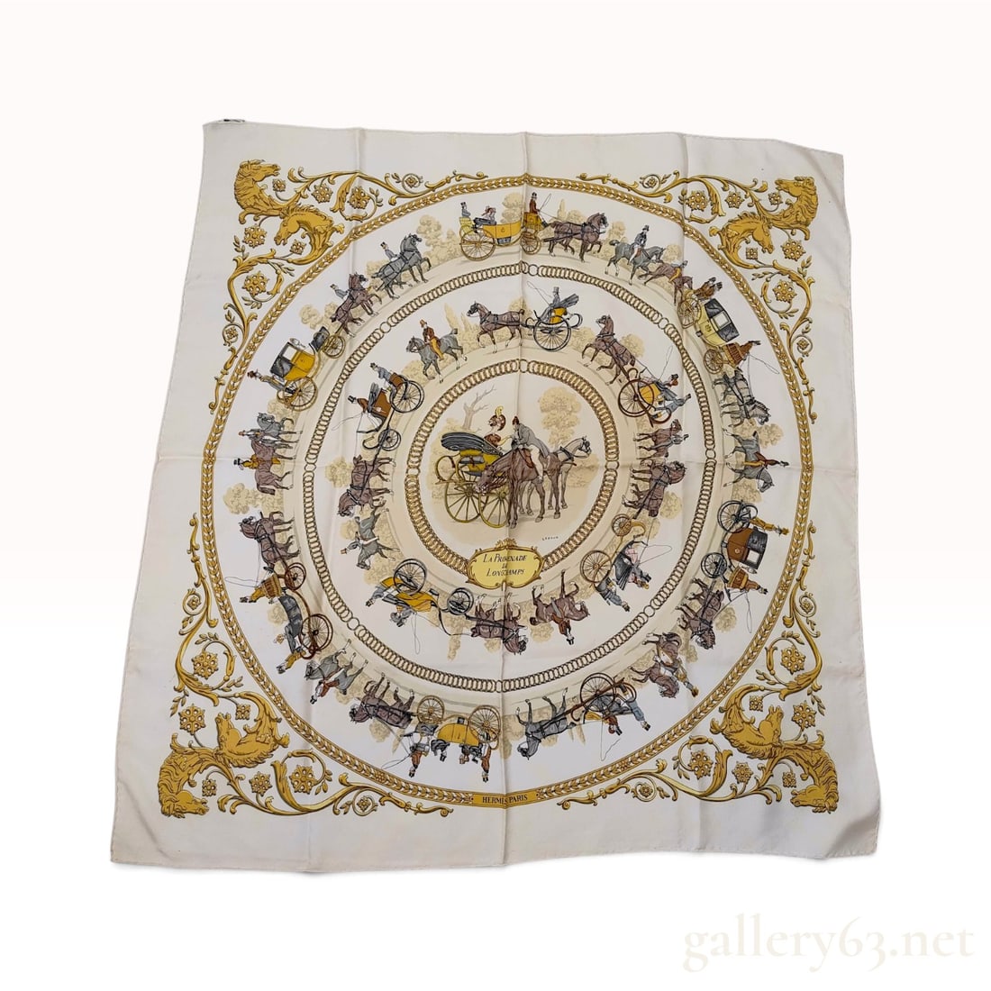 Vintage Hermes La Promenade de Longchamps Silk Carre 90: This vintage Hermes silk carre 90 features the La Promenade de Longchamps pattern designed by Philippe Ledoux. The composition is arranged in concentric circles depicting an equestrian promenade with 