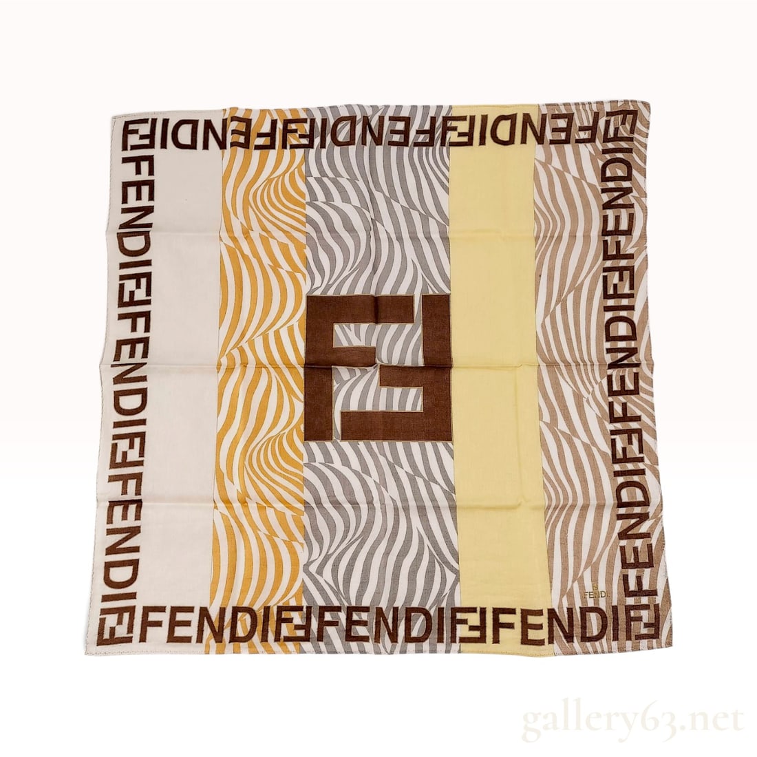Fendi Zebra Stripe Multi-Color Woven Cotton Scarf 58 cm: This Fendi scarf is crafted from a woven cotton fabric featuring a tonal jacquard checkerboard ground. The design is organized into vertical bands of varying colors and patterns including cream, orang