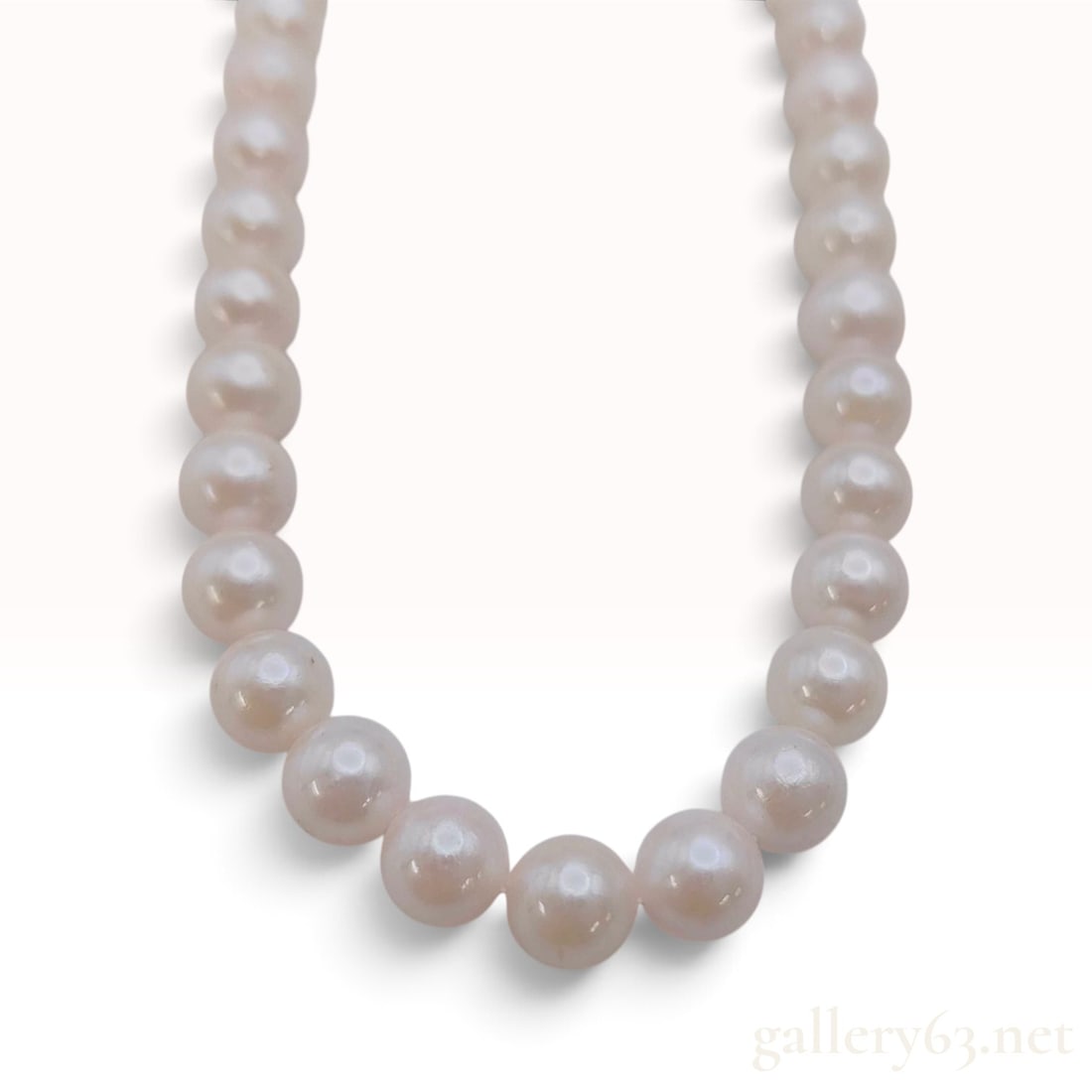 A Cultured Pearl and Silver Single Strand Necklace (1 of 5)