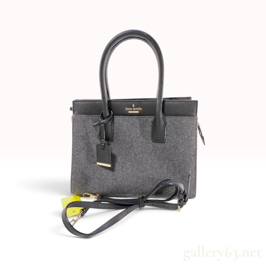 Kate Spade Cameron Street Candace Grey Wool and Black Saffiano Leather Satchel Bag: This Kate Spade New York satchel bag is the Cameron Street Candace model, featuring a mixed-media construction of gray wool felt and black Saffiano-textured leather trim. The structured design include