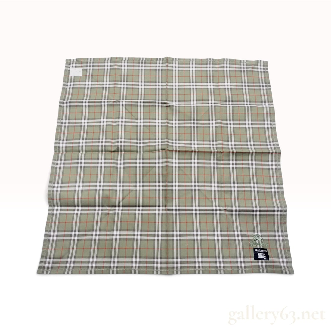Vintage Burberrys Nova Check Sage Green Cotton Scarf 47 cm with Tags: A Vintage Burberrys scarf crafted from fine cotton featuring the house Nova check pattern in a sage green colorway. The design is detailed with white, dark brown, and thin red accent lines. The square