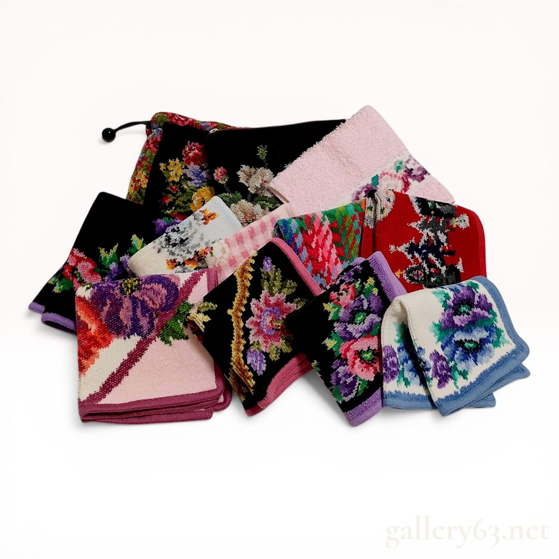 A Collection of Feiler Chenille Cotton Floral Handkerchiefs and Pouch: A collection of Feiler floral-patterned textile accessories made in Germany. The group consists of several square chenille cotton handkerchiefs and a drawstring pouch featuring colorful motifs such