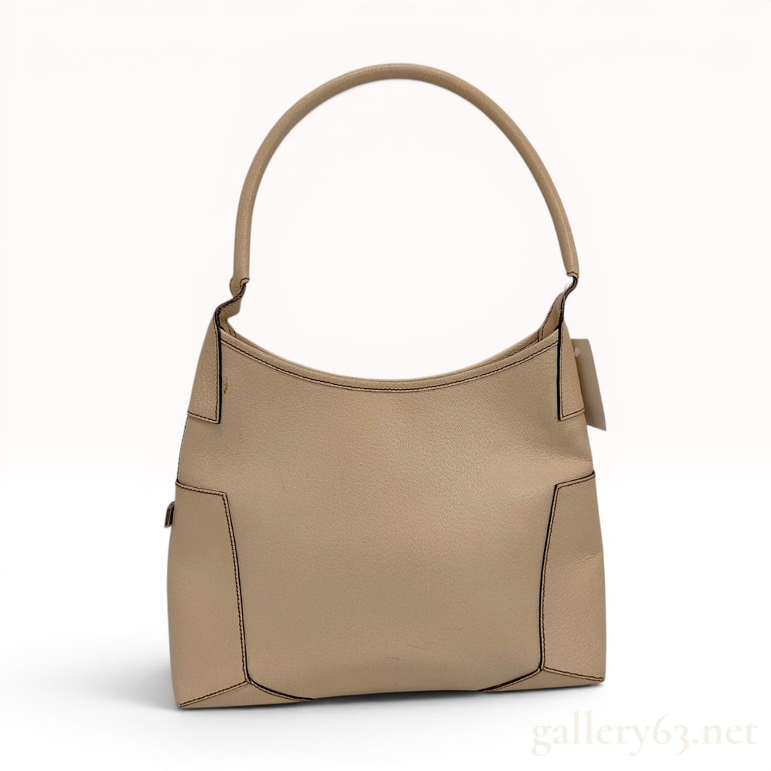 Salvatore Ferragamo Beige Grained Leather Hobo Shoulder Bag: This Salvatore Ferragamo hobo shoulder bag is crafted from beige grained leather. It features a structured silhouette with a single curved, rolled shoulder handle. The exterior design includes decorat