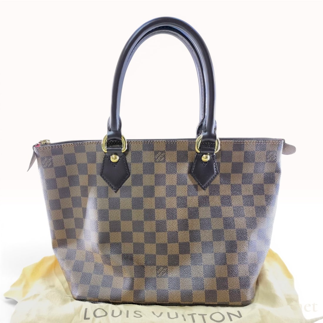 Louis Vuitton Damier Ebene Saleya PM Tote Bag: A Louis Vuitton Saleya PM tote bag featuring the signature Damier Ebene checkered coated canvas with dark chocolate brown leather trim and piping. The bag is designed with a structured trapezoidal sil