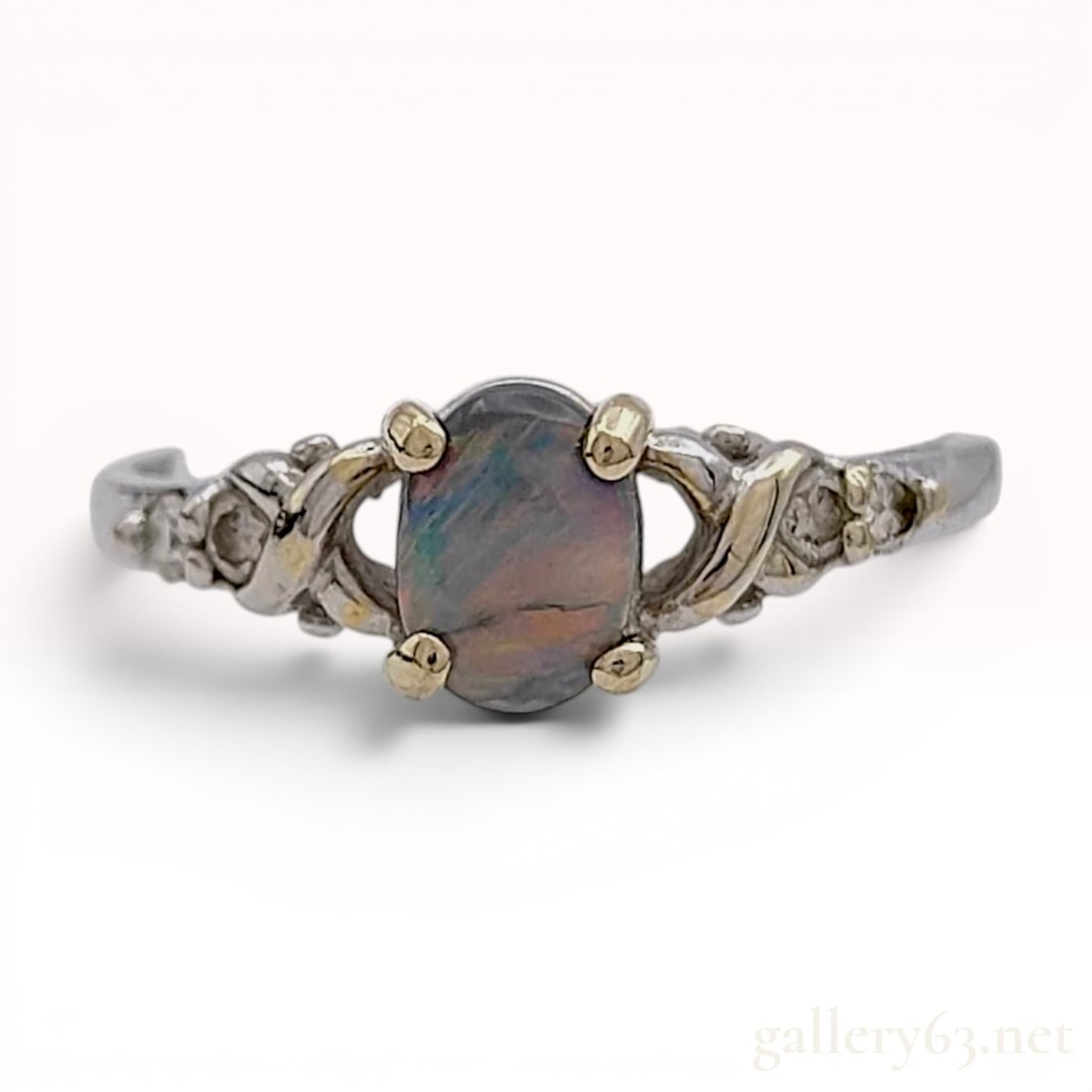 An 18 Karat Two-Tone Gold Black Opal and Diamond Ring (1 of 9)