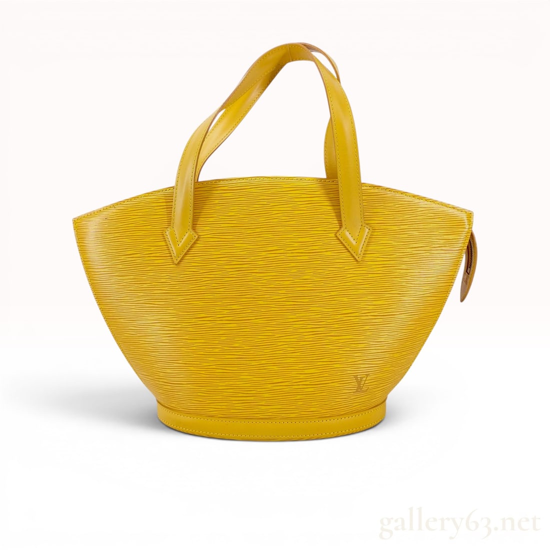 Louis Vuitton Tassil Yellow Epi Leather Saint Jacques PM Handbag: This Louis Vuitton Saint-Jacques PM handbag is constructed from Tassil Yellow Epi leather, featuring a textured horizontal grain and a signature fan-shaped silhouette. The bag sits on a structured ova