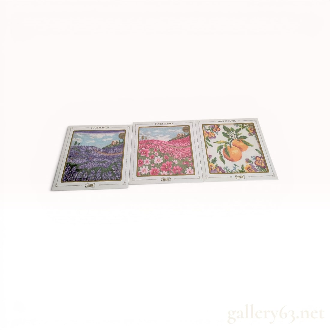 A Trio of Feiler Four Seasons German Chenille Handkerchiefs: Trio of Feiler German cotton chenille handkerchiefs from the Four Seasons collection. The set includes two landscape designs depicting fields of lavender and cosmos flowers, and one botanical pattern 