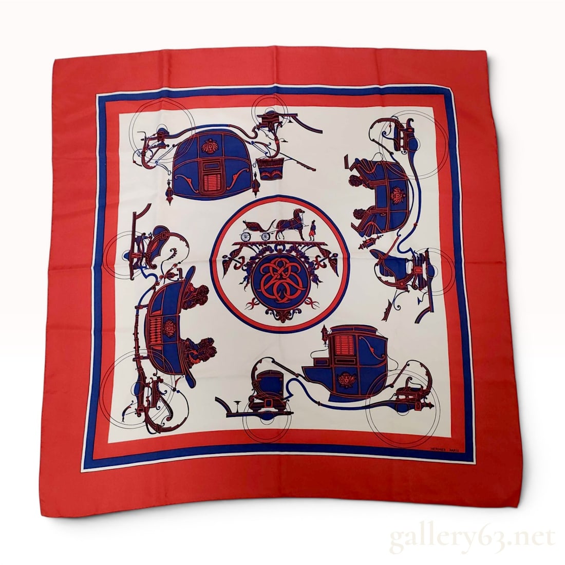Hermes Ex-Libris Silk Gavroche Scarf or Pocket Square: Hermes silk Gavroche scarf in the classic Ex-Libris pattern, originally designed by Hugo Grygkar in 1946. The design features a central equestrian medallion and corner carriage motifs screen-printed i