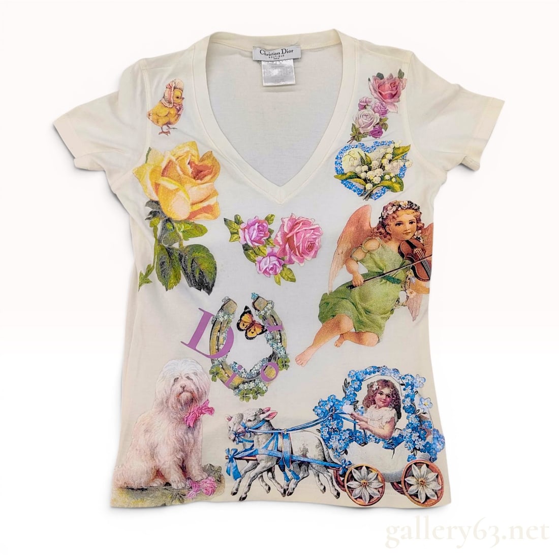 Christian Dior John Galliano Era Romantic Kitsch Graphic V-Neck T-Shirt: This is a Christian Dior Boutique Paris short-sleeved V-neck t-shirt from the John Galliano era, circa the early 2000s. The garment is crafted from cream-colored 100 percent cotton and features an ecl