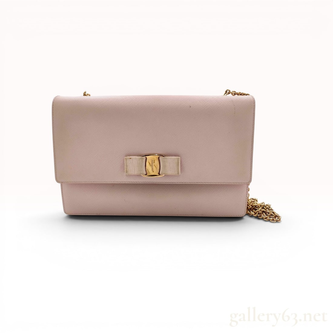 Salvatore Ferragamo Ginny Vara Bow Saffiano Leather Shoulder Bag: Salvatore Ferragamo Ginny shoulder bag in light pink Saffiano leather featuring a removable gold-tone chain strap and the signature Vara grosgrain bow. The front flap includes an engraved gold-tone me