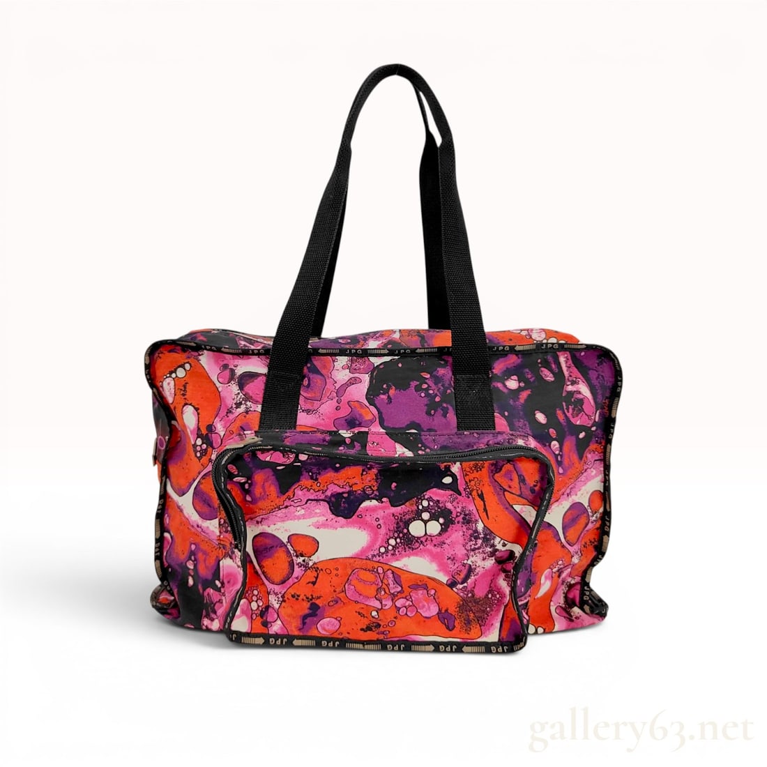 Jean Paul Gaultier JPG Large Marbled Print Tote Bag: Jean Paul Gaultier large tote bag from the JPG line featuring a fabric body with an all-over neon pink, orange, and purple marbled print. The exterior is detailed with black nylon webbing shoulder str