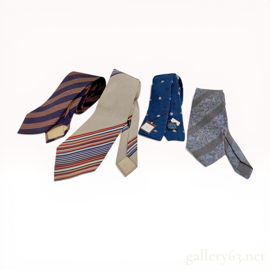 A Lot of Four Christian Dior Monsieur and Cravates Men's Neckties: Christian Dior Monsieur and Cravates men's neckties, late 20th century. Collection comprises three woven silk ties in diagonal striped and abstract floral patterns, along with one 100% lambswool knit 