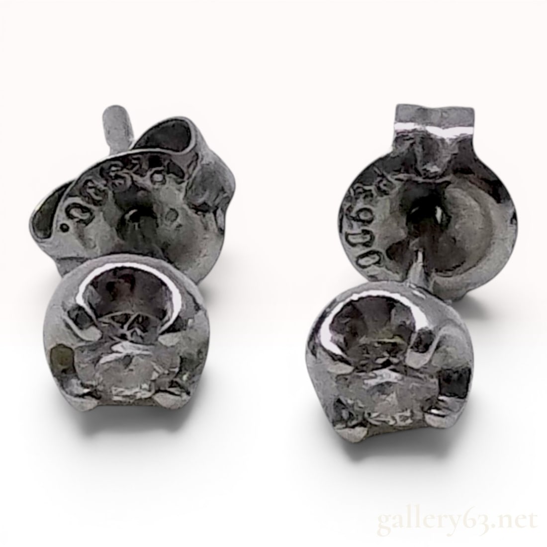 A Pair of Platinum and Round-Cut Diamond Stud Earrings (1 of 10)
