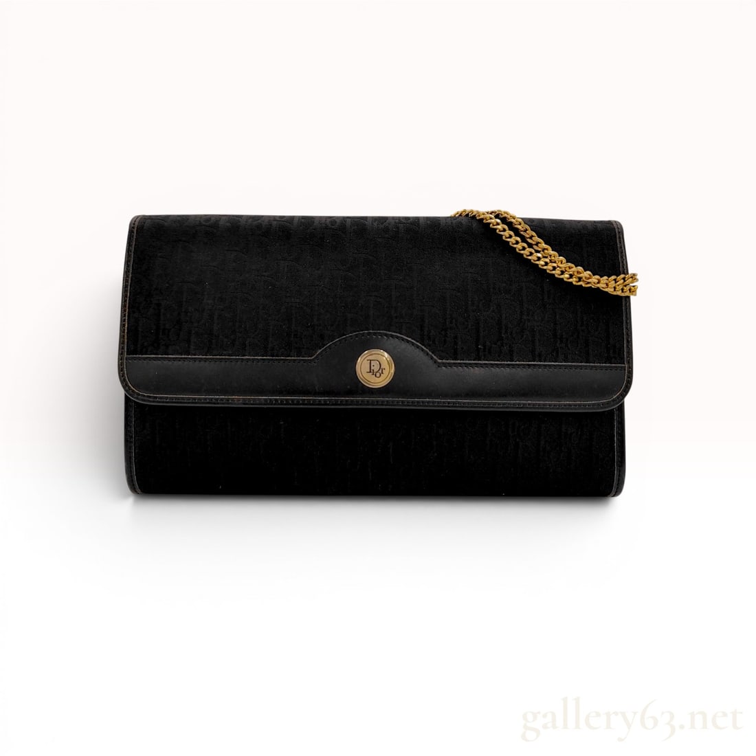 Christian Dior Black Trotter Monogram Canvas Chain Clutch Bag: Vintage Christian Dior envelope clutch crafted in black Diorissimo monogram canvas with tonal leather trim, circa 1970s-1980s. The exterior features a front flap with a circular gold-tone Dior logo em