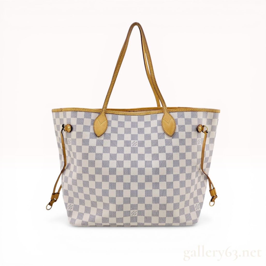 Louis Vuitton Neverfull MM Tote Bag in Damier Azur Canvas: Louis Vuitton Neverfull MM tote bag, circa early 21st century. Constructed from signature Damier Azur coated canvas with natural vachetta leather handles, top rim piping, and side cinch cords. Feature
