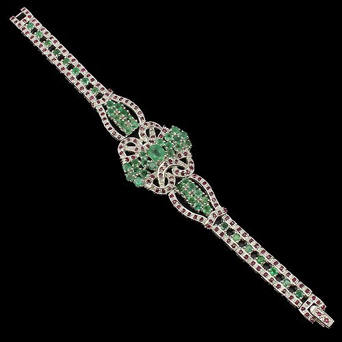 Estate 16 Carat Multistone Bracelet: Estate bracelet featuring emerald and rubies surrounding the entire band. Set in solid 925 sterling. Over 16cts tw.