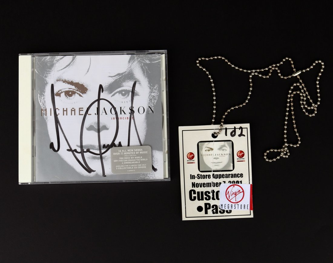 Michael Jackson Signed Blue Invincible Cd Michael Jackson Signed Blue Invincible Cd
