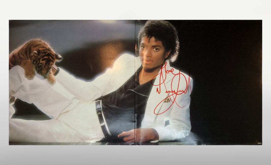 Michael Jackson signed Thriller album inside poster (1 of 2)