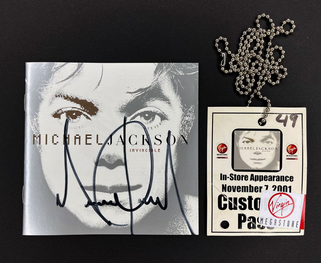 Michael Jackson Signed Silver Invincible Cd Booklet Michael Jackson Signed Silver Invincible Cd Booklet
