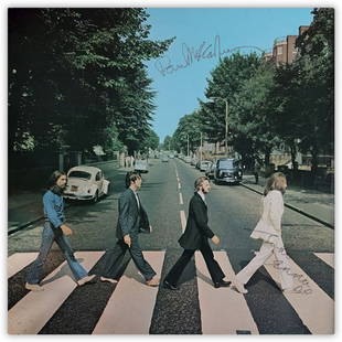 John Lennon and Paul McCartney Signed Abbey Road Vinyl: Abbey Road Vinyl autographed by John Lennon and Paul McCartney. An early pressing Vinyl copy of the The Beatles's Abbey Road Parlophone LP (PCS 1267) Made in the UK in 1969. Signed by John Lennon in b