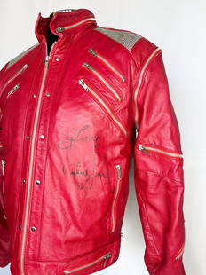 Michael Jackson Signed Beat It Jacket: KnaiszLive.Com Presents: A Michael Jackson-signed red "Beat It" style leather jacket. The vintage jacket is signed in black marker at left breast "Love Michael Jackson." Accompanied by a Knaisz