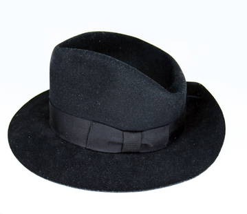 Michael Jackson owned worn black fedora 2002: KnaiszAuctions.com & KnaiszLive.Com Present: Michael Jackson's personal, black, unsigned fedora, from 2002. The interior of the hat reads: "Michael Jackson" in gold font. Estimate: $5,000-6,000 PLEASE